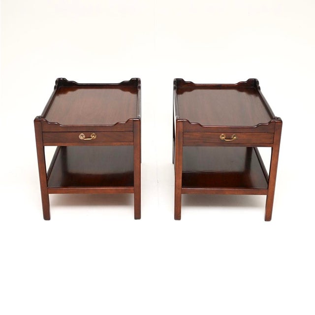 A very well made and useful pair of antique Georgian style side tables. They were made in England, and date from around...