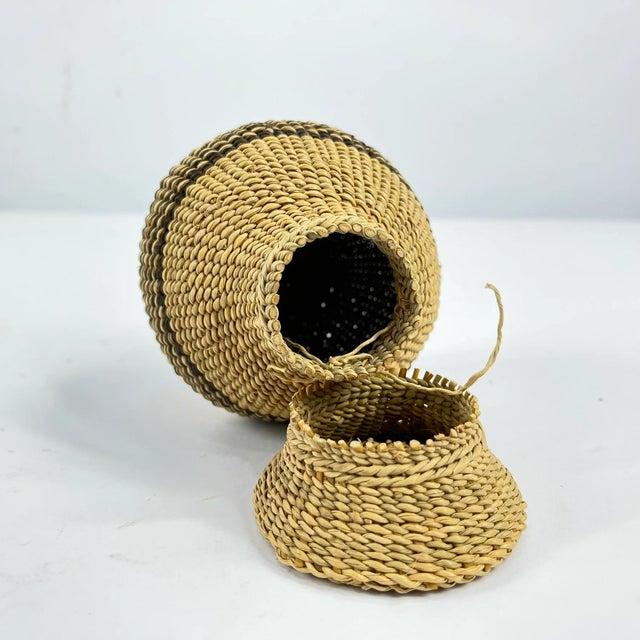 Zulu tight-weave basket with lid, used for herbs. Zulu herb basket used to store small herbs for culinary purposes and...