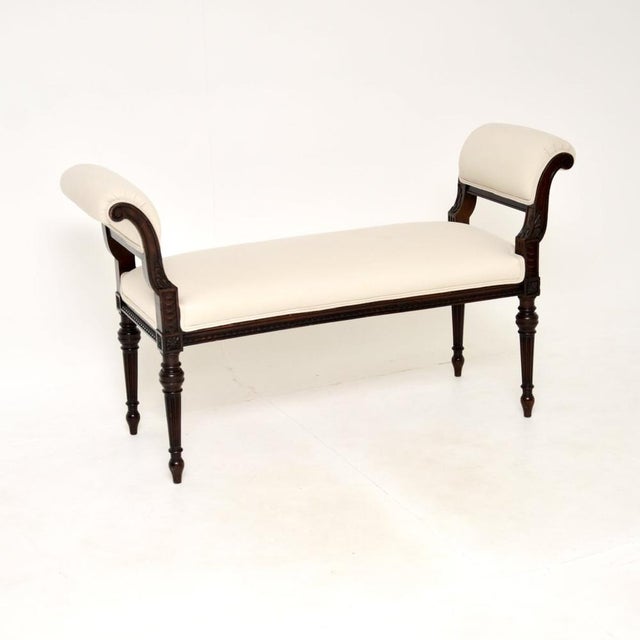 A stunning antique Victorian carved bench / stool by Waring and Gillows. This was made in England, it dates from around...