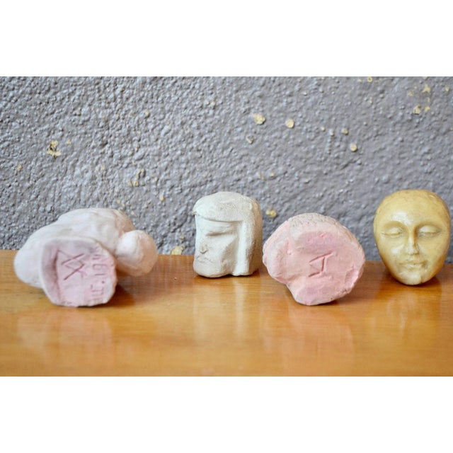 Decorative objects for display cases or cabinets of curiosities, these 4 sculpted heads are student exercises at the...