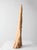 This natural sculptural wood form features an elongated silhouette, flowing contours, and a naturally weathered surface...