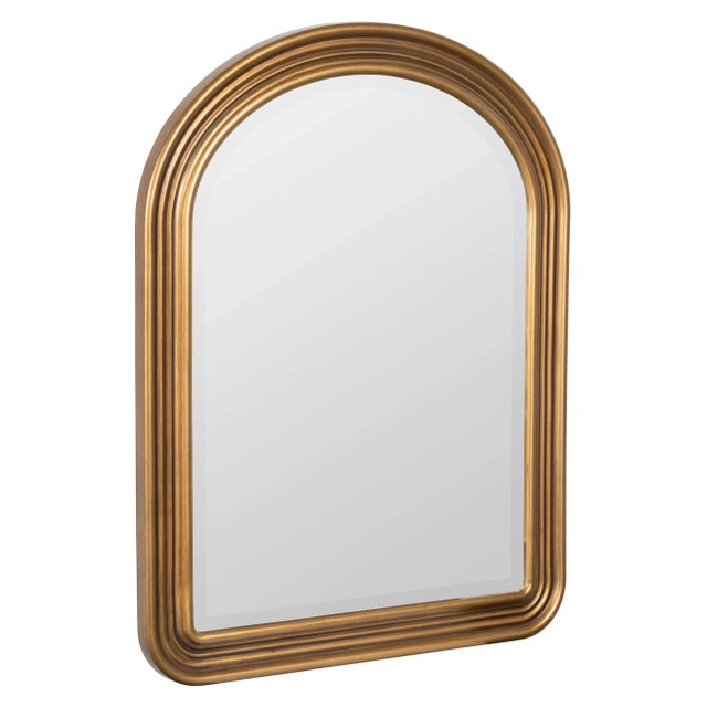 This mirror has soft rounded edges and a timeless gold frame making it the perfect arch mirror for any space. Material:...