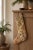 Hand-cut from a genuine vintage Turkish wool kilim, this stocking pairs a warm terracotta toe with a cream leg carrying a...