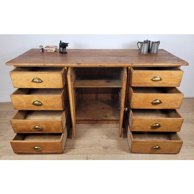 This is a gorgeous pine sideboard that is sure to impress in a Victorian style kitchen or dining room setting. Circa 1890....