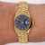 Rolex Lady DateJust 6917 in 18K gold with automatic movement, blue dial, and president bracelet. Complete with box and...