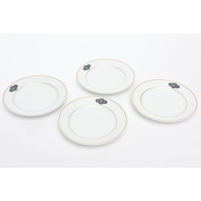 This set of 4 classic porcelain plates are a collaboration between Fornasetti and Rosenthal. They have the 3 medusas on...
