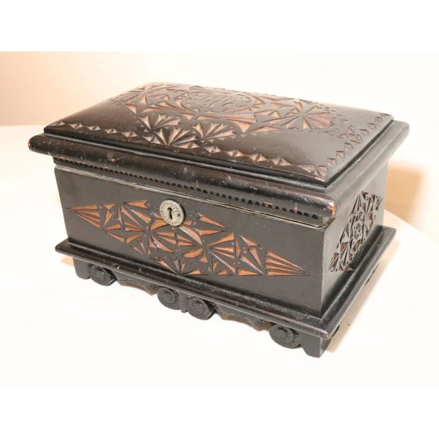 Up for sale is a nice quality antique 19th century handmade chip carved wooden box. The wooden box is made out of an...