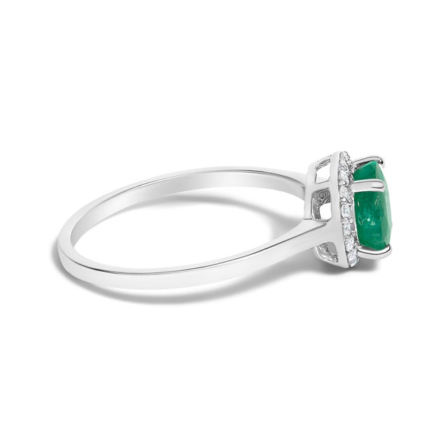Adorn your hand with the splendor of rich, velvety green captured in a mesmerizing 6x6 mm emerald, its fiery hues deepened...