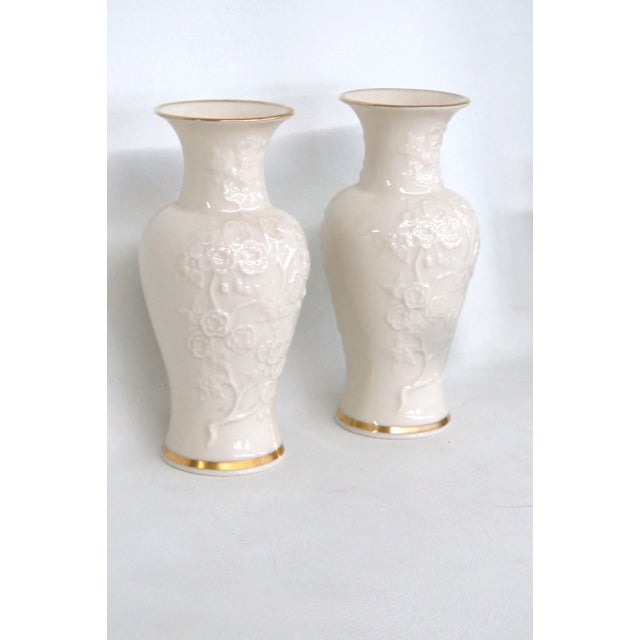 This gorgeous Pair of 2 Vases are made of porcelain. These lovely vases are stamped on the bottom as being made in the USA...