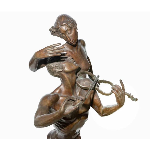Bronze sculpture realized with double patina green and brown. Stamp signed in the base, with stamp of foundry. Very good...