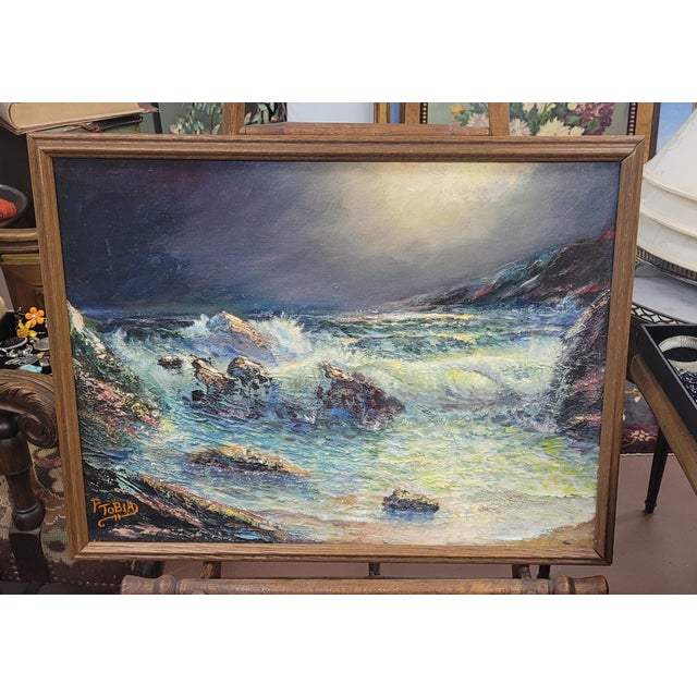 Fine mid-century period oil painting of the ocean breaking against rocks done in a semi-impasto style which ads another...