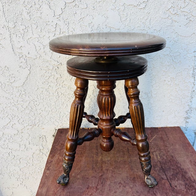 Beautiful antique oak swivel piano / organ stool, dating approximately to the late 19th or early 20th century. This is a...
