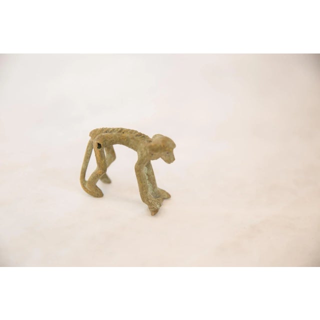 African Vintage African Oxidized Bronze Monkey Holding Banana For Sale - Image 3 of 6