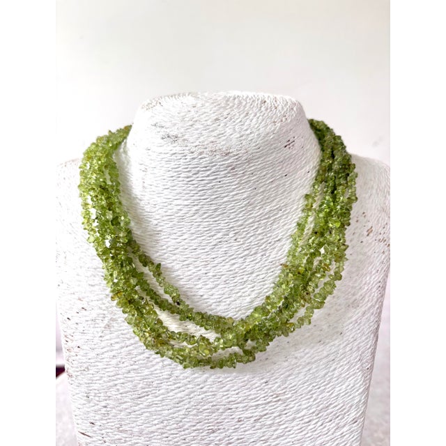 Lovely, vintage sterling silver and Peridot multi strand necklace.