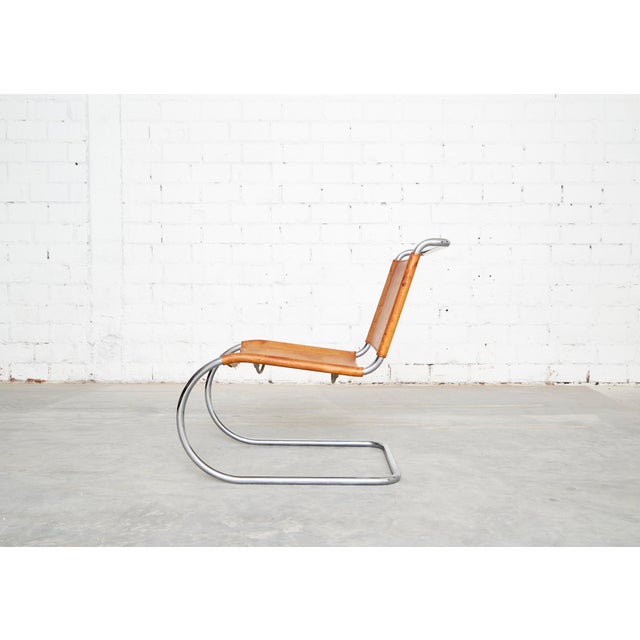 Condition: covering made of cognac-colored core leather. The leather shows a distinct patina. Number stamp on the...