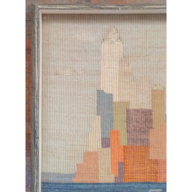 We are selling this cool mid-century Textile cityscape. This interesting woven embroidery features a colorful cityscape...