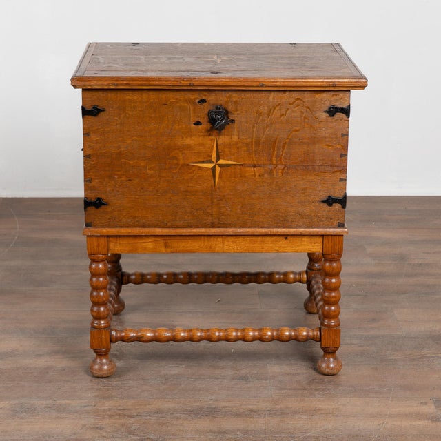 Early 19th Century Oak Trunk on Stand Side Table Early 19th-century oak trunk set on a later stand, now serving as a...