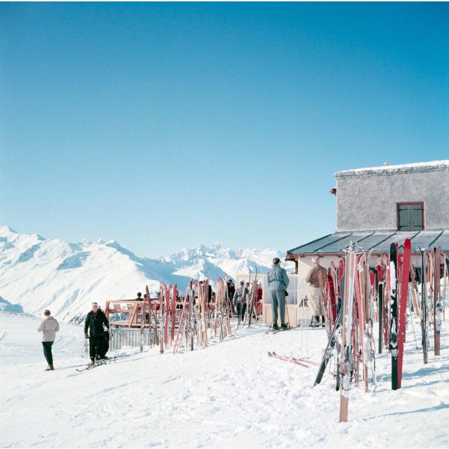 Mountain Top by Toni Frissell Skis stacked up at a mountain top terrace, Klosters, Switzerland, 1951. (Photo by Toni...