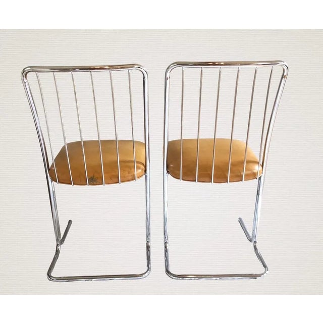 Set of 2 Daystrom mid century modern chrome and vinyl dinette kitchen chairs model #410 dated 1976. You may want to...