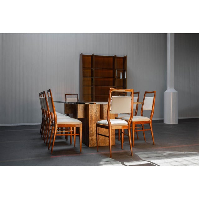 Unique Vittorio Dassi dining chair manufactured in Italy 1950. These chairs feature beautifully shaped teak frames and the...