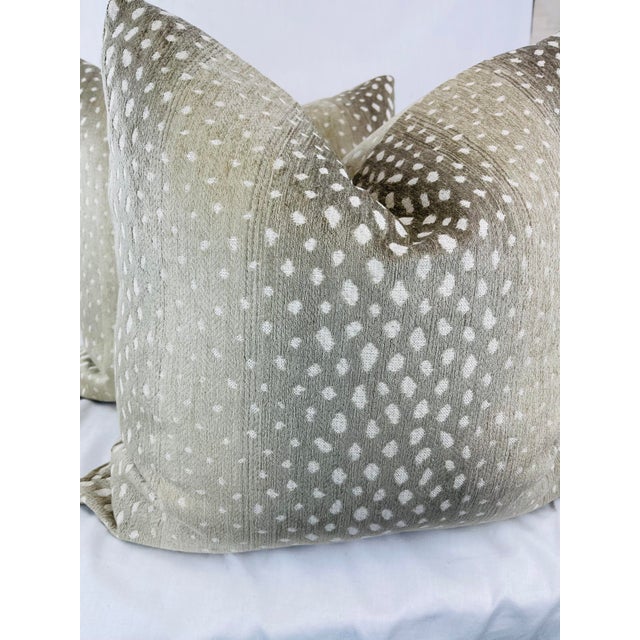 Custom pair of 22" pillows covered in Thibaut "Gazelle" chenille in color linen. These pillows have tapered corners to...