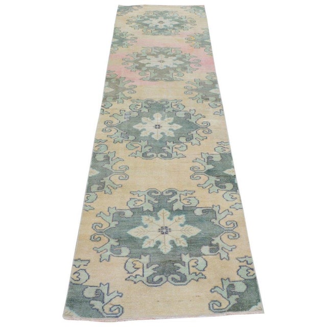 Vintage Turkish Oushak hand knotted rug with natural colors, contemporary style and soft texture.