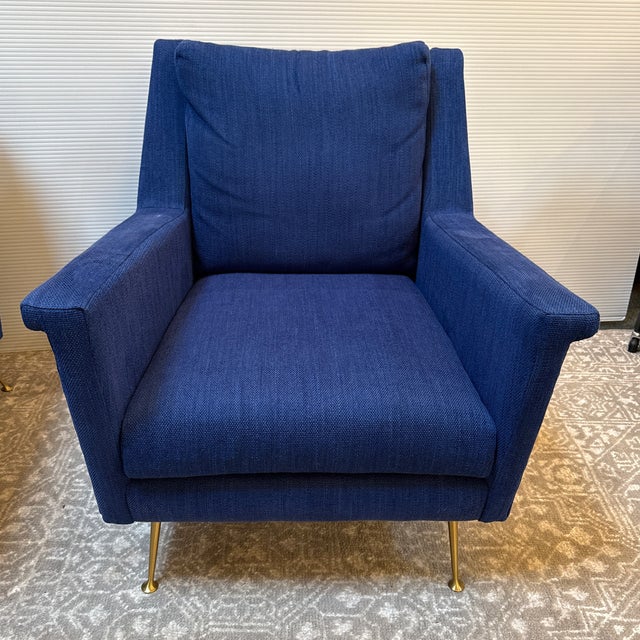 Design Plus Gallery presents a Carlo Arm Chair from West Elm. Designed with a strong, angular profile but with deep...