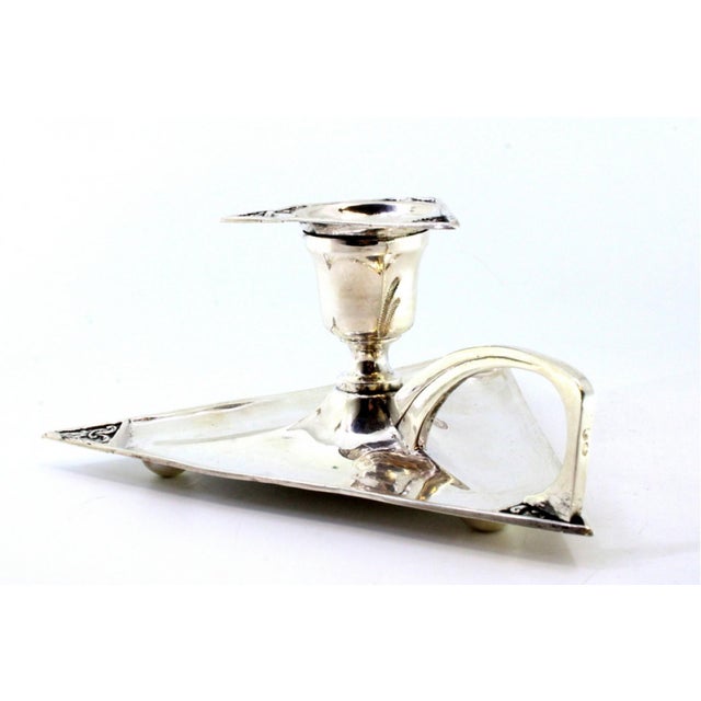 Triangular Shaped Silver Paddle with Fleur-De-Lis Reliefs, in Very Good conditions. Designed from 2000 This piece has an...