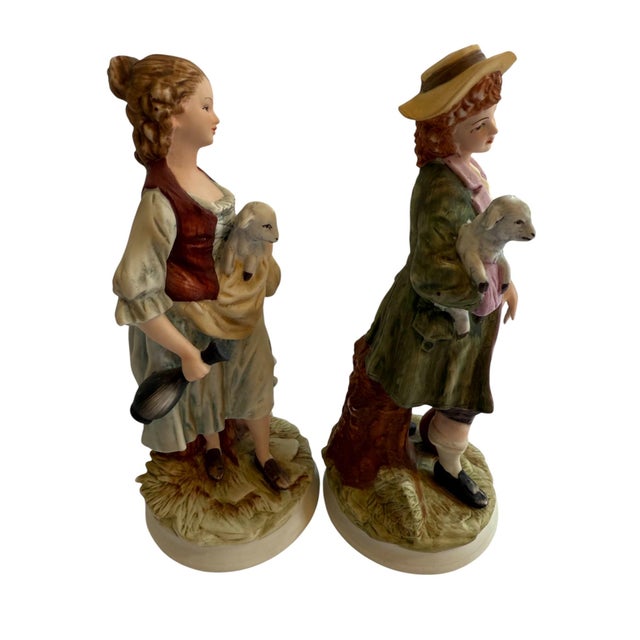 Girl and Boy Holding Sheep 8259 by Andrea by Sadek This french country pair of figurines is the perfect addition to your...