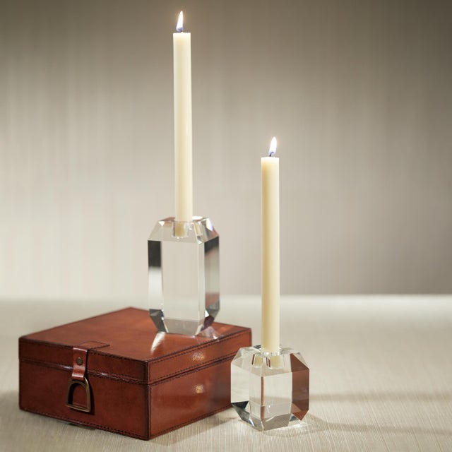 Light up the room with contemporary style with this taper candle holder, featuring a sleek clear faceted design we can’t...