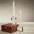 Light up the room with contemporary style with this taper candle holder, featuring a sleek clear faceted design we can’t...
