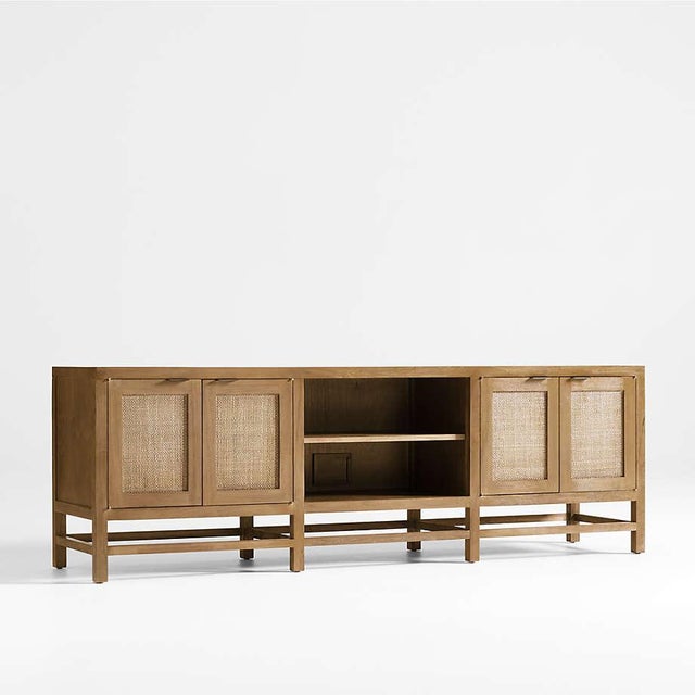 This is a light brown Credenza with rattan doors. Composed of Teak and Teak veneer. The photos make it appear worn,...