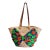 A Giselle Handwoven Straw Basket / Tote Featuring a Large Bow Made From Colorful Print and Brown Leather Shoulder Straps. For Sale