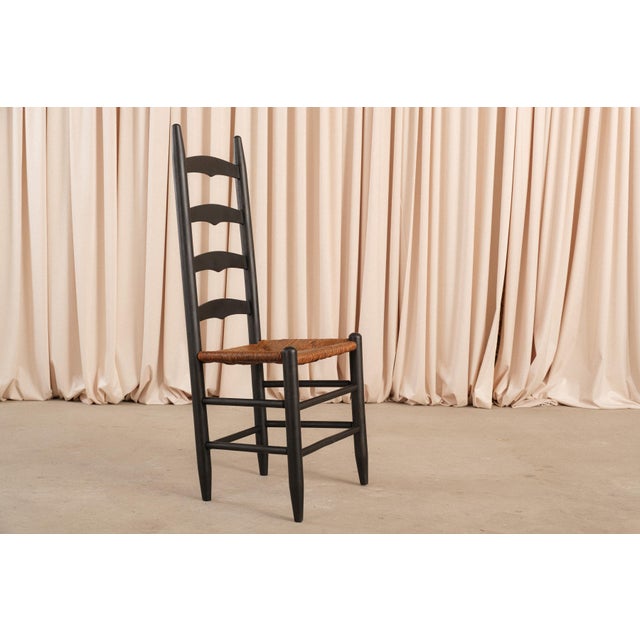A set of six antique American Shaker ladder back dining chairs with hand-woven rush seats, a classic of American folk...