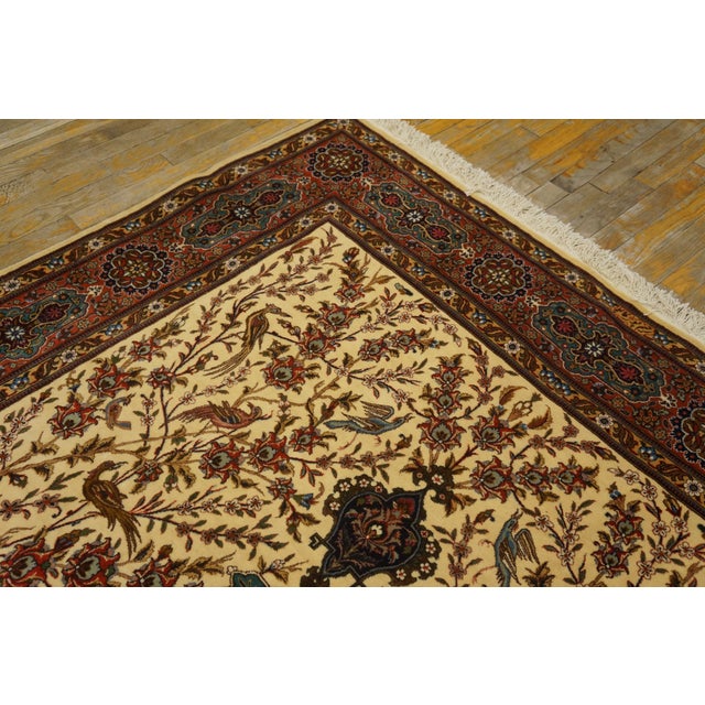 Antique Tabriz rug, measures 5'9" x 8'10".