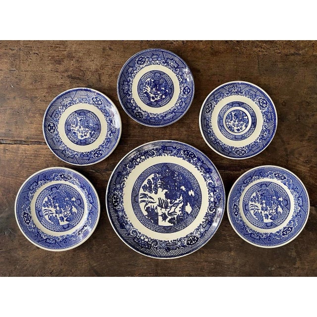 Collection of six vintage blue Willow plates, this collection has similar patterns, but may have different manufacturers,...
