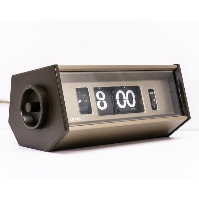 ➝ vintage copal 702 flip clock (1970s - 220v 50hz) featuring a one-piece anodized aluminum housing with real glass front —...