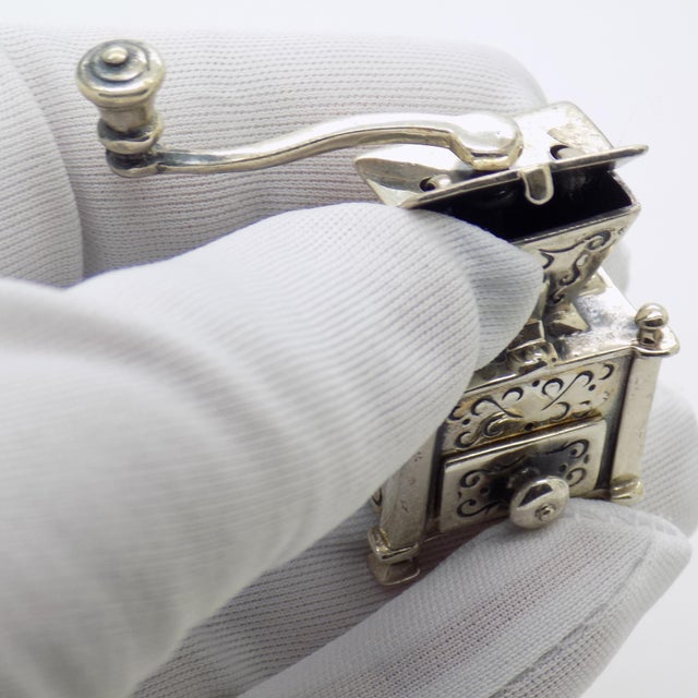 Rare vintage sculpture full of charm and atmosphere, depicting an antique style coffee grinder, handcrafted in italy...