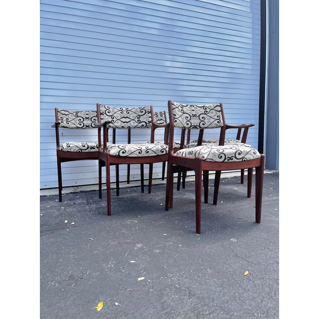 Mid-century Scandinavian modern dining chairs. Set of six, including armchairs and two side chairs by Scandinavian Woodworks.