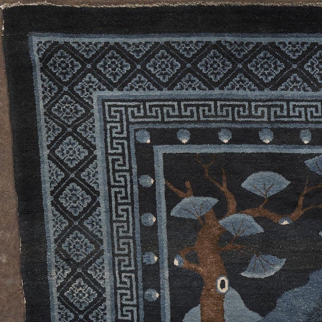 Hand-knotted wool carpet. Origin: Beijing This piece is attributed to the mentioned designer/maker. It has no attribution...