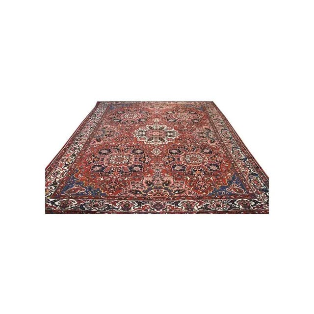 ACTUAL SIZE: 13’6″ x 19’10” PRIMARY COLOR: Rust / Ivory AGE: Old MATERIALS: Wool FOUNDATION: Cotton PRODUCTION: Handwoven,...