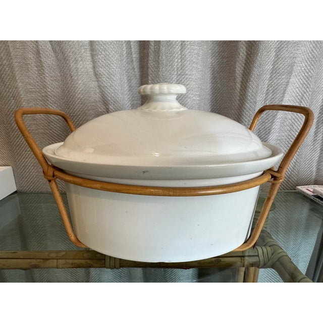 Vintage Iconic Arabia Finland white ceramic tureen with decorative removable bamboo stand and handles.
