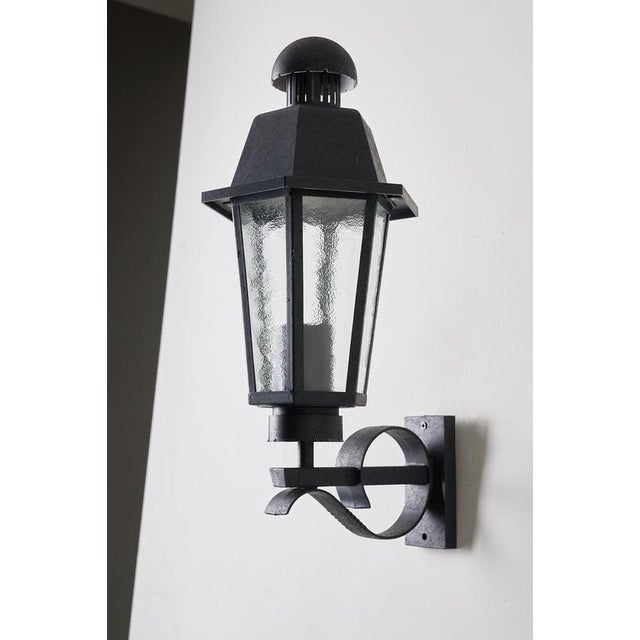 This outdoor wall lantern was produced by the german manufacturer bega, a brand synonymous with world-class outdoor...