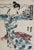 Original Japanese ukiyo-e woodblock print by Keisai Eisen (1790–1848), an artist specializing in bijin-ga (images of...
