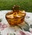 This Stunning 1930s Art Deco Czech Bohemian Cut Amber Glass Dresser/ Vanity Set consists of a Powder Container w/ Lid,...
