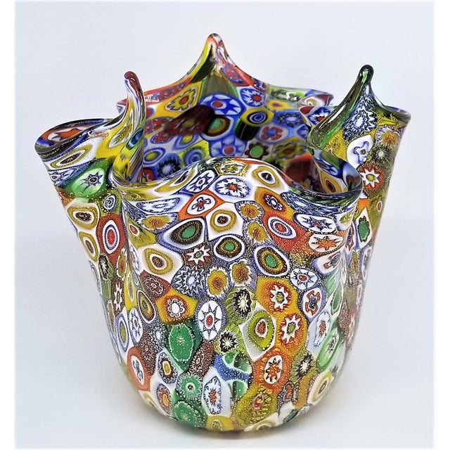 Offering an extraordinary Murano glass millifiori hankerchief vase made in Italy by Campanella, circa 1980s. This vase is...