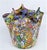 Offering an extraordinary Murano glass millifiori hankerchief vase made in Italy by Campanella, circa 1980s. This vase is...