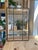 Offered is a vintage leaded glass window panel featuring clear beveled glass set within metal caming. Each panel is...
