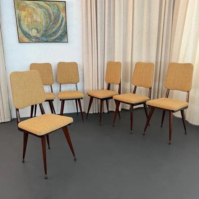 This stunning set of six Italian Mid-Century Modern side dining chairs are unattributed yet comparable to Italian masters...