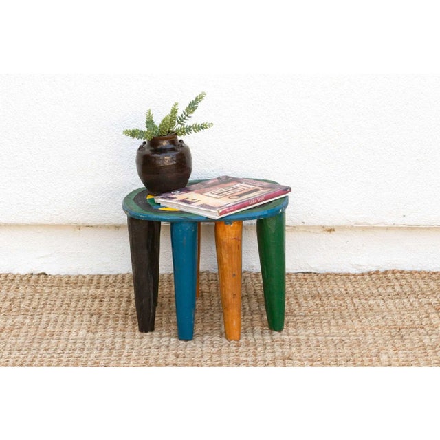 A unique piece of African art, this vintage Nupe table from Nigeria is a must-have for collectors and enthusiasts of Nupe...